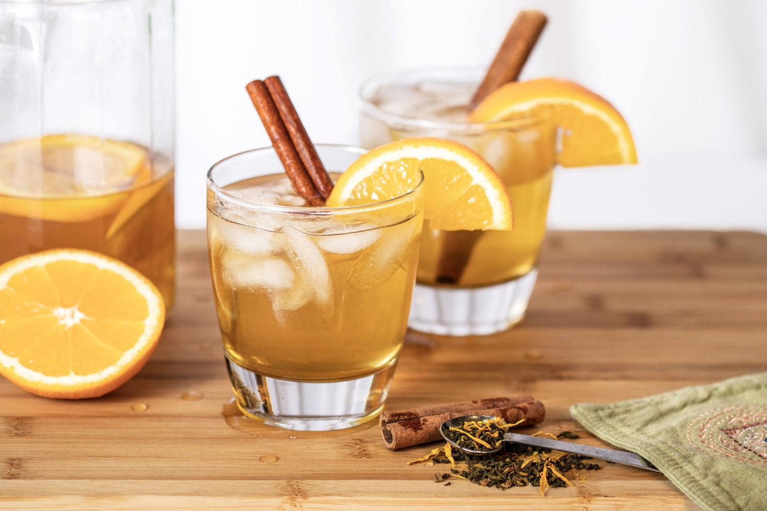 turmeric ginger iced tea with lemon and cinnamon sticks for inflammation