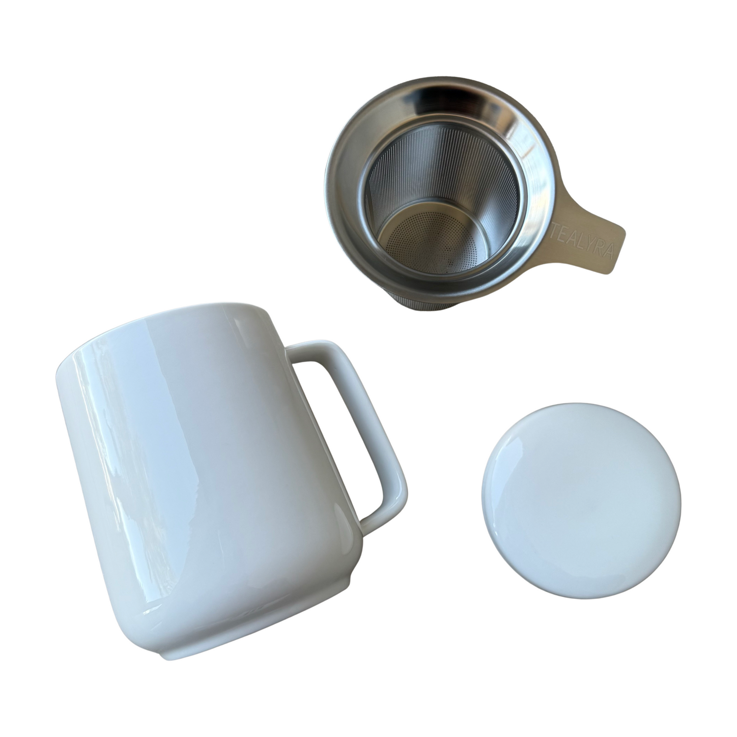 White ceramic tea infuser mug