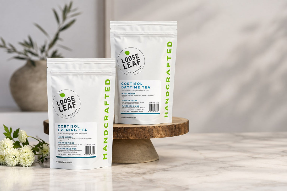 Loose Leaf Tea Market Cortisol Evening Tea and Cortisol Daytime Tea pouches on a marble counter